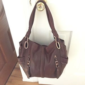 Beautiful brown leather bag with rose gold trim
